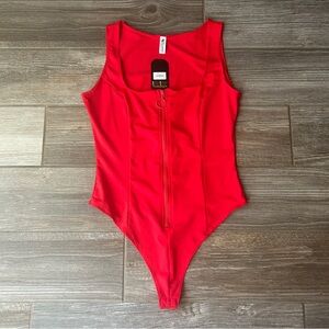 New with Tags WONDERLAND‎ Red Bodysuit One Piece High-Cut, Rave/Festival Wear